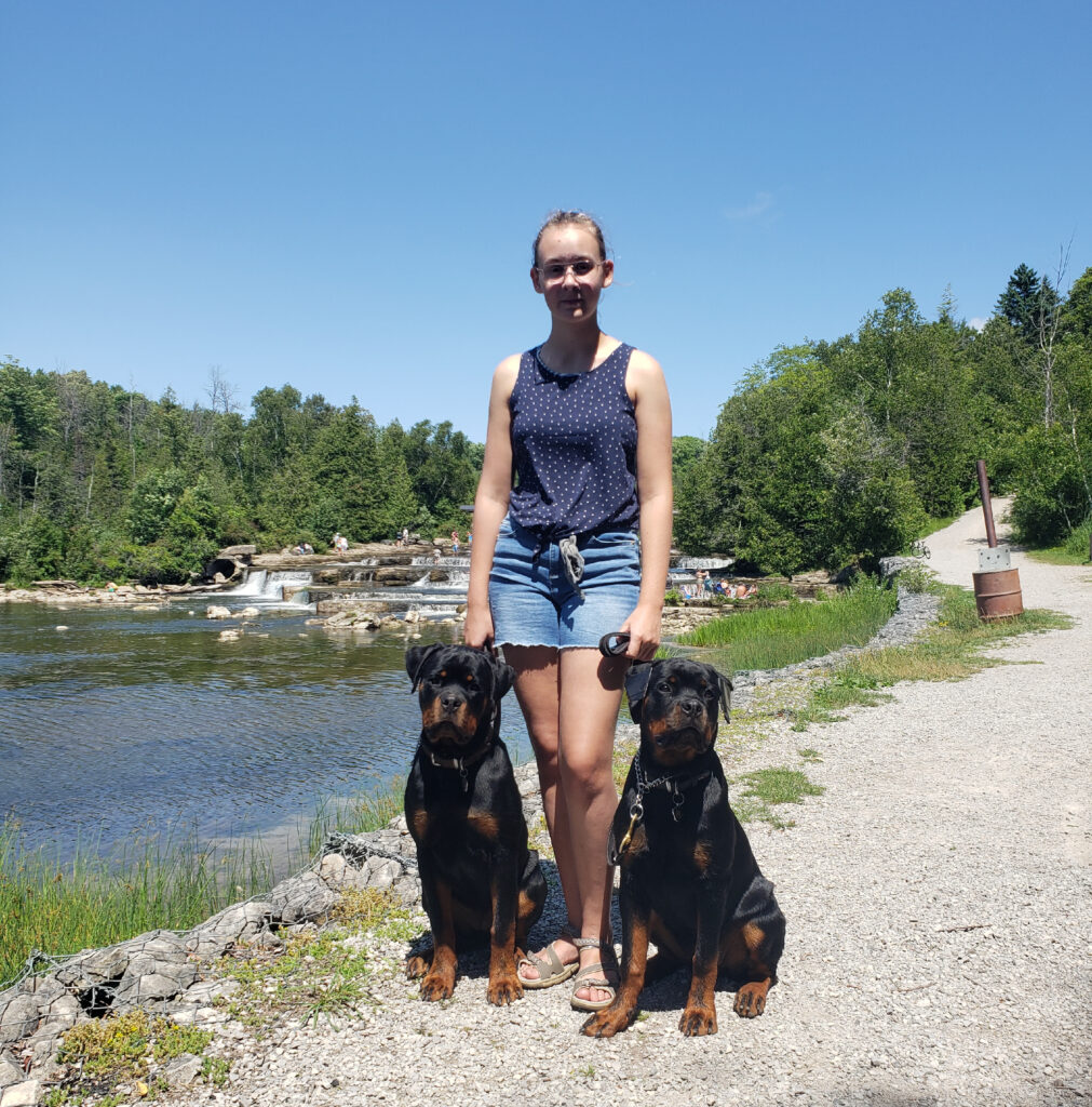 Mylene Haney's daughter walking with her dogs